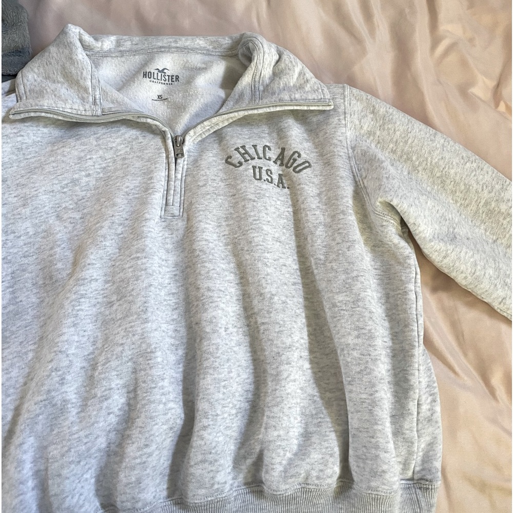 this chicago grey and green sweater is from hollister!